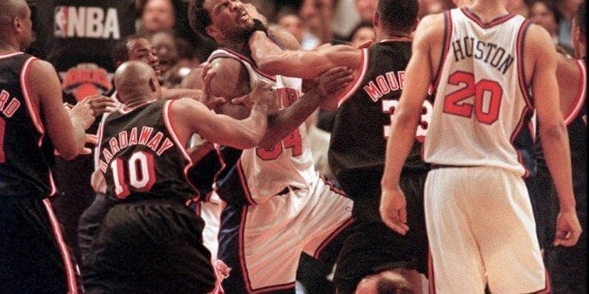 Alonzo-Mourning-is-restrained-by-Knicks-Charles-Oakley-and-Knicks-coach-Jeff-Van-Gundy-660x330.jpg